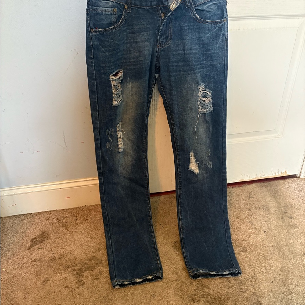 Distressed Blue Jeans